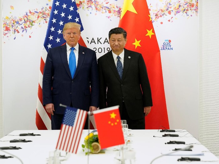 Donald Trump dan Xi Jinping. Foto: Reuters Donald Trump dan Xi Jinping. Foto: Reuters
