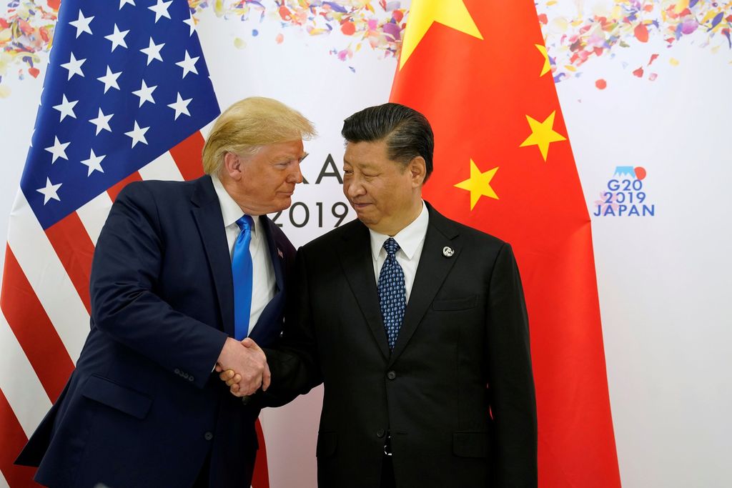 U.S. President Donald Trump poses for a photo with China's President Xi Jinping before their bilateral meeting during the G20 leaders summit in Osaka, Japan, June 29, 2019. REUTERS/Kevin Lamarque