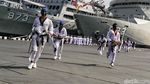 Defile Pasukan dan Aksi Taekwondo Meriahkan HUT Kolinlamil
