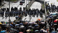 Aksi protes tersebut masih berkaitan dengan penolakan RUU ektradisi yang kontroversial. Thomas Peter/Reuters.