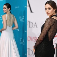 Emmy Rossum sepertinya menjadikan punggungnya sebagai aset untuk berpose menawan di red carpet. Ia kerap kali terlihat menghadap belakang saat dipotret fotografer. Foto: Getty Images