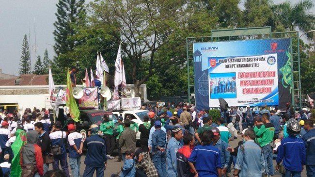 Orang Terkaya Jepang Suntik Grab Rp 28 T, Awas Gelombang PHK