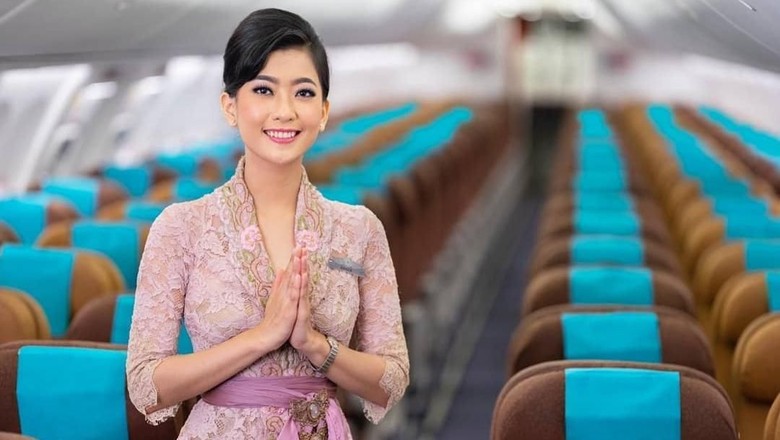 Pramugari Garuda Indonesia Pramugari Garuda Indonesia dalam balutan kebaya Anne Avantie.