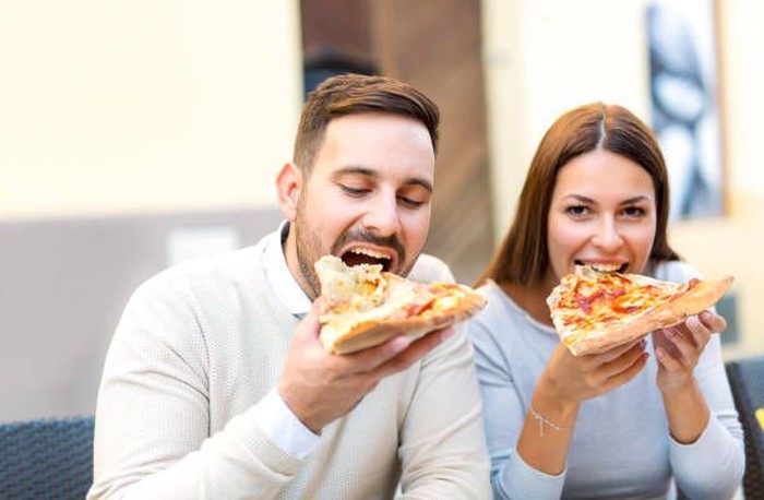 Menu Makan Kekasih Happy loving couple enjoying breakfast in a cafe. Love, dating, food, lifestyle