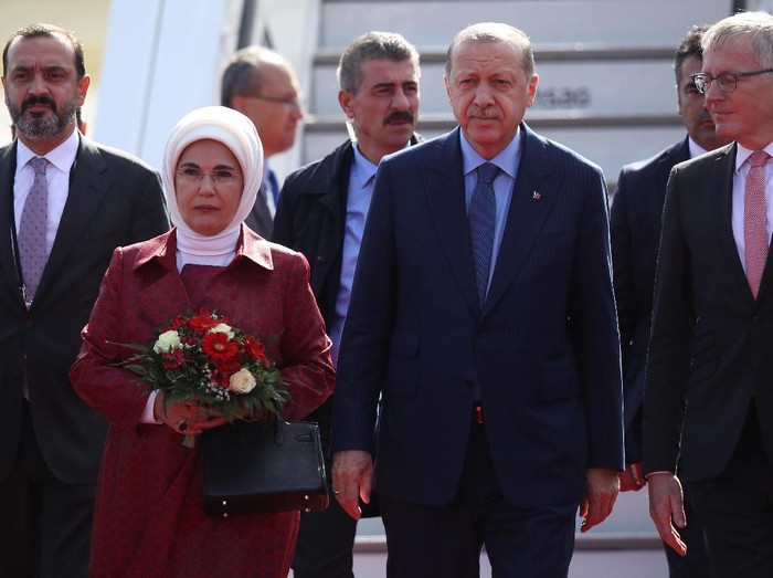 Emine Erdogan Turkish President Recep Tayyip Erdogan and his wife Emine Erdogan arrive at Kansai airport in Izumisano city, Osaka prefecture, on June 27, 2019 ahead of the G20 Osaka Summit. (Photo by CHARLY TRIBALLEAU / AFP)