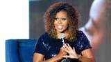 Foto: Jarang Terjadi, Michelle Obama Pamer Wujud Asli Rambut Afronya