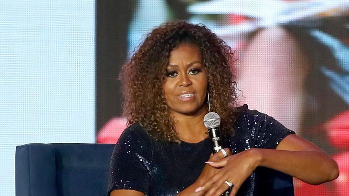 NEW ORLEANS, LOUISIANA - JULY 06: Michelle Obama speaks onstage during the 2019 ESSENCE Festival Presented By Coca-Cola at Louisiana Superdome on July 06, 2019 in New Orleans, Louisiana. (Photo by Bennett Raglin/Getty Images for ESSENCE)