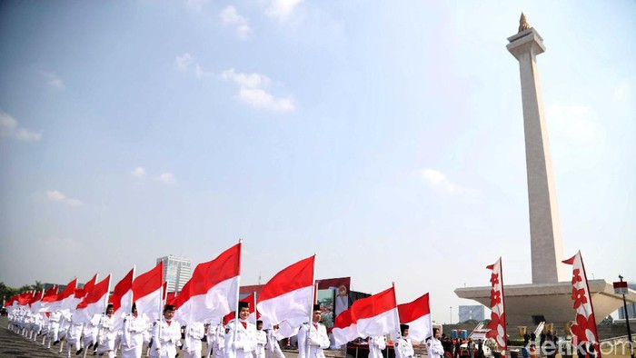 Perayaan HUT Bhayangkara ke-73 di Monas, Rabu (10/7/2019). Beragam aksi menarik mulai dari marching band hingga aksi bela diri turut meriahkan acara itu.
