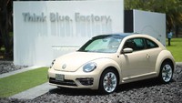 Awalnya, VW Beetle dibuat sebagai mobil terjangkau pada masanya. Mobil itu dibuat untuk mempromosikan kepemilikan mobil di antara orang Jerman. Hector Vivas/Getty Images.