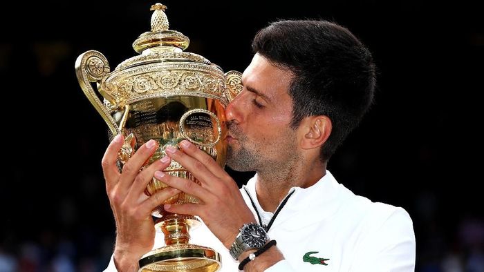Novak Djokovic juara Wimbledon 2019 (Clive Brunskill/Getty Images) Novak Djokovic juara Wimbledon 2019 (Clive Brunskill/Getty Images)