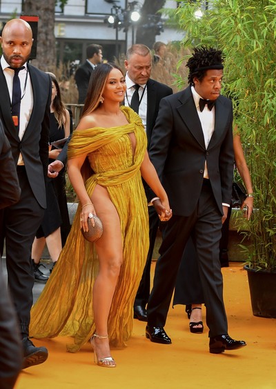 1161990921 LONDON, ENGLAND - JULY 14: Beyonce Knowles-Carter and Jay-Z attend the European Premiere of Disneys The Lion King at Odeon Luxe Leicester Square on July 14, 2019 in London, England. (Photo by Gareth Cattermole/Getty Images for Disney)
