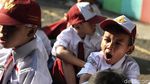 Lucu! Beragam Ekspresi Siswa SD di Hari Pertama Sekolah