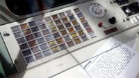 Penampakan mesin kontrol yang ada di dalam pesawat Apollo 11 yang digunakan astronot untuk berkomunikasi selama melakukan misi pendaratan di bulan. Lindsey Wasson/Reuters.