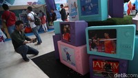 Foto-foto itu menunjukkan pemain yang pernah juara hingga belum pernah mencicipi kampiun. Hanya bedanya, jika foto bisanya dipasang di pigura. Di Indonesia Open, foto dipasang dalam sebuah kotak yang berdesain televisi. Di mulai dari foto Susy Susanti, Lee Chong Wei, Tontowi Ahmad/Liliyana Natsir, hingga Tommy Sugiarto.