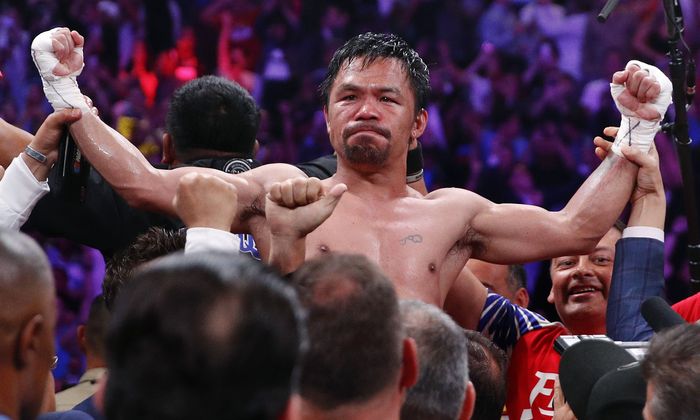 Manny Pacquiao vs Keith Thurman Manny Pacquiao reacts after defeating Keith Thurman by split decision in a welterweight title fight Saturday, July 20, 2019, in Las Vegas. (AP Photo/John Locher)