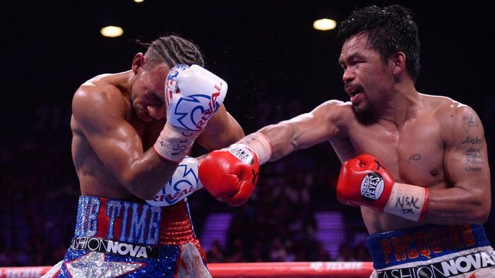 Petinju Manny Pacquiao meraih gelar WBA Super kelas welter. (Foto: Reuters) Petinju Manny Pacquiao meraih gelar WBA Super kelas welter. (Foto: Reuters)
