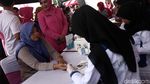 Melihat Pak Polisi Mengkhitan Anak-anak