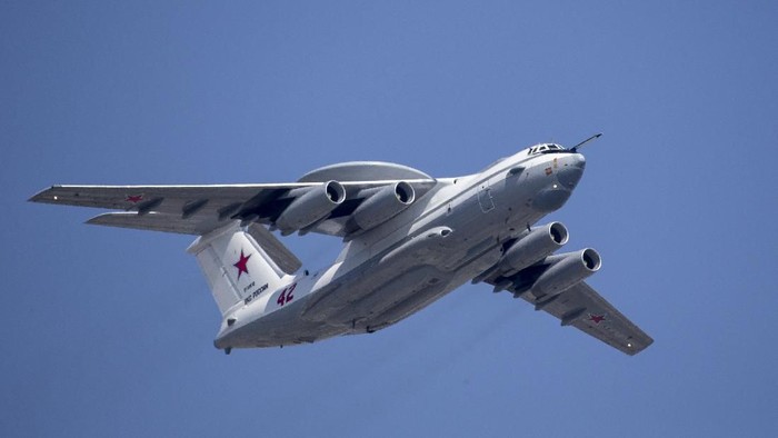 FILE - In this file photo taken on Tuesday, May 7, 2019, A Russian Beriev A-50 airborne early warning and control training aircraft flies over Red Square during a rehearsal for the Victory Day military parade in Moscow, Russia.  South Korean air force jets fired 360 rounds of warning shots after a Russian military plane briefly violated South Koreas airspace twice on Tuesday, Seoul officials said, in the first such incident between the two countries. (AP Photo/Alexander Zemlianichenko, Pool, File)