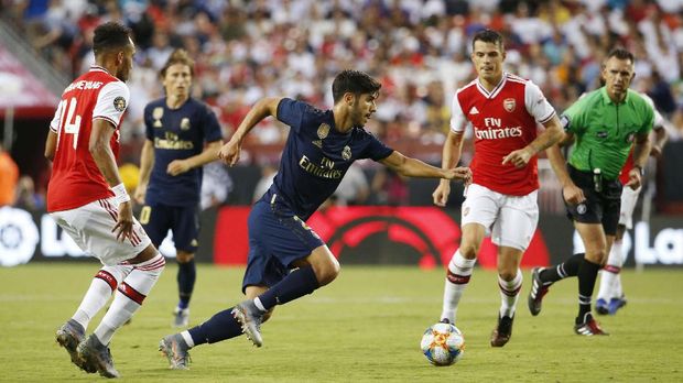 Marco Asensio mengalami cedera saat Real Madrid melawan Arsenal.