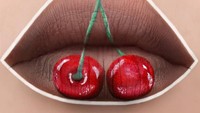 Karyanya yang satu ini diberi nama My Cherry Lips. Ia membuat gambar buah ceri dari goresan lipstick berwarna merah. Foto: Instagram tutushka_makeup