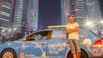 Foto: Traveling Keliling Dunia Naik Mobil Listrik