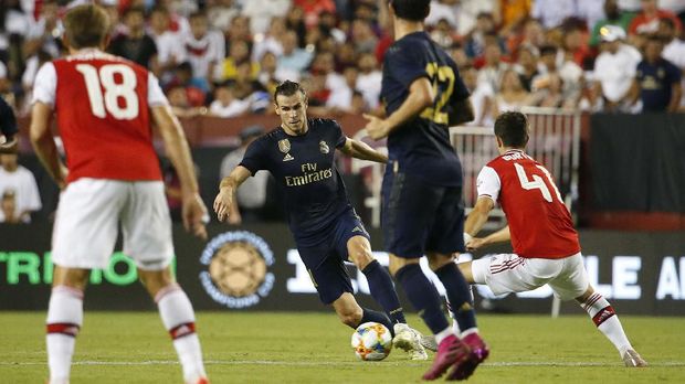 Gareth Bale mencetak gol pertama Real Madrid saat melawan Arsenal.