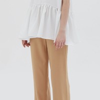 Tak semua orang bisa menggunakan celana jeans untuk bekerja. Sedangkan jika harus pakai celana hitam setiap hari, penampilan bisa jadi membosankan. Karena itu, pilihan celana berpotongan lurus warna krem berikut dapat jadi opsinya. Edition Trousers Yellow dari brand Shopatvelvet ini bisa dimiliki dengan Rp 299 ribu. Foto: Dok. Bobobobo