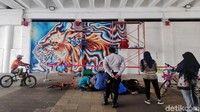 Kegiatan melukis mural di Terowongan Kendal itu diselenggarakan untuk merayakan 25 tahun hubungan Sister City Jakarta-Berlin.
