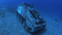 Museum ini dapat diakses para wisatawan dengan menggunakan perahu belantai kaca. Aqaba Special Economic Zone Authority/Handout via Reuters.