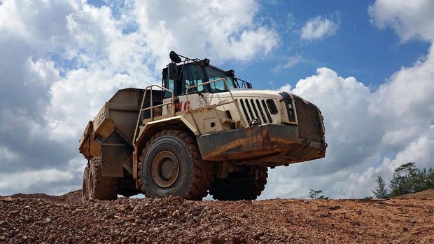 A truck passes through a tin mining area of Indonesia's PT Timah in Pemali, Bangka island, Indonesia, July 25, 2019. REUTERS/Fransiska Nangoy