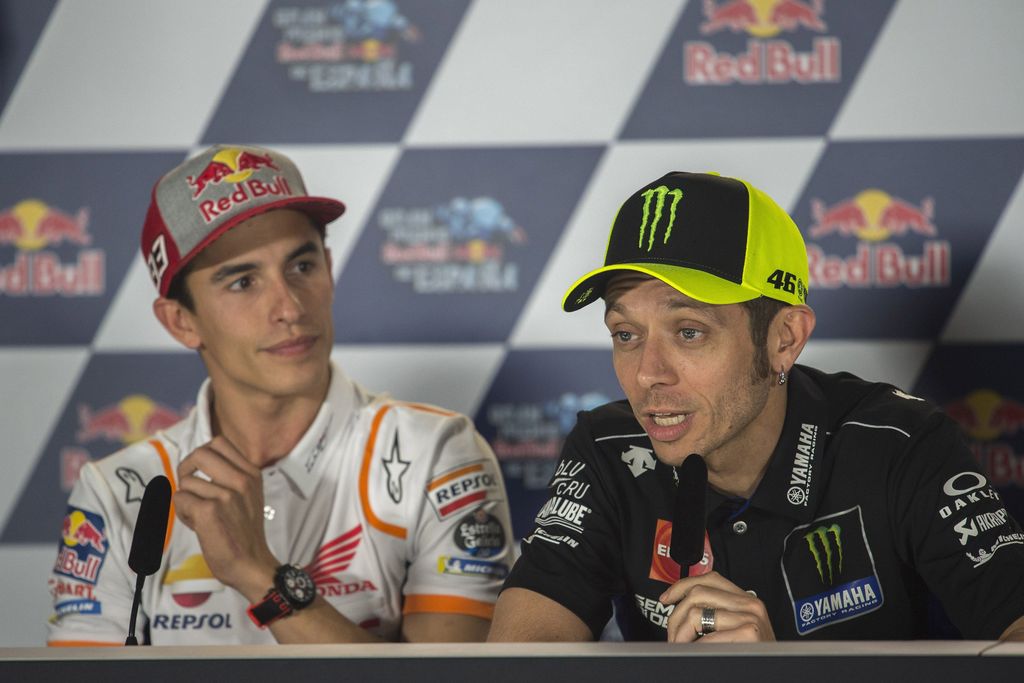 JEREZ DE LA FRONTERA, SPAIN - MAY 02: Valentino Rossi of Italy and Yamaha Factory Racing (R) speaks and Marc Marquez of Spain and Repsol Honda Team looks on during a press conference prior to the MotoGp of Spain at Circuito de Jerez on May 02, 2019 in Jerez de la Frontera, Spain. (Photo by Mirco Lazzari gp/Getty Images)