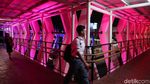 Menikmati Warna-warni Skybridge Penghubung LRT-TransJ