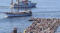 Tak jauh dari air, penduduk Oslo di Norwegia berbondong-bondong untuk datang ke Pelabuhan Sorenga. Mereka mencairkan suasana panas ekstrem dengan berenang. (Erik Johansen/REUTERS)