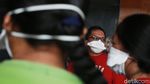 Massa Bermasker Hadiri Sidang Gugatan Polusi Udara Jakarta
