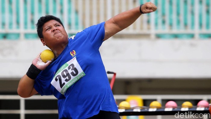 Eki Febri Ekawati berhasil mendapatkan medali emas setelah berhasil melakukan lemparan terbaiknya sejauh 14,39 meter.