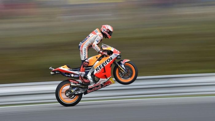 Marc Marquez menyamai rekor pole terbanyak MotoGP, yang dipegang Mick Doohan. (Foto: Michael Cizek / AFP) Marc Marquez menyamai rekor pole terbanyak MotoGP, yang dipegang Mick Doohan. (Foto: Michael Cizek / AFP)