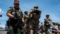 Insiden horor tersebut dilaporkan terjadi di sebuah pusat perbelanjaan di El Paso, Texas, pada Sabtu (3/8/2019). Foto: Joel Angel Juarez/AFP