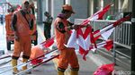 Pasukan Oranye Merah Putihkan Jalan Fatmawati Sambut HUT RI