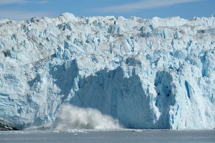 ILULISSAT, GREENLAND - AUGUST 04: Icebergs float in Disko Bay at sunset on August 04, 2019 near Ilulissat, Greenland. The Sahara heat wave that recently sent temperatures to record levels in parts of Europe has also reached Greenland. Climate change is having a profound effect in Greenland, where over the last several decades summers have become longer and the rate that glaciers and the Greenland ice cap are retreating has accelerated.   (Photo by Sean Gallup/Getty Images)