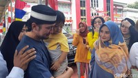 Caleg dari PAN itu ditahan setelah dilaporkan melanggar aturan pemilu dengan membagikan kupon umrah.
