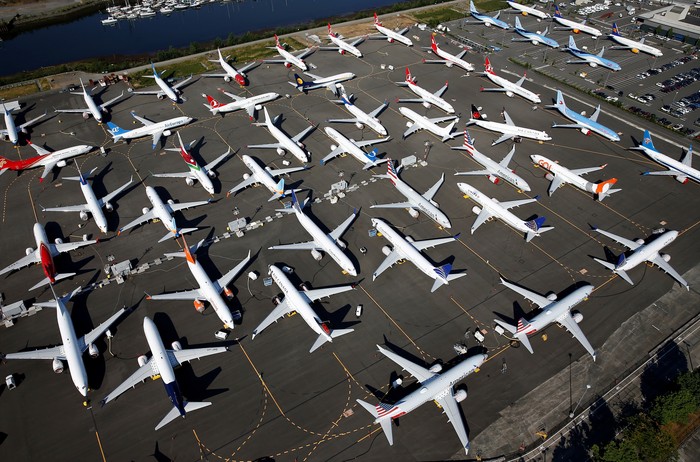 Dozens of grounded Boeing 737 MAX aircraft are seen parked in an aerial photo at Boeing Field in Seattle, Washington, U.S. July 1, 2019. Picture taken July 1, 2019. REUTERS/Lindsey Wasson