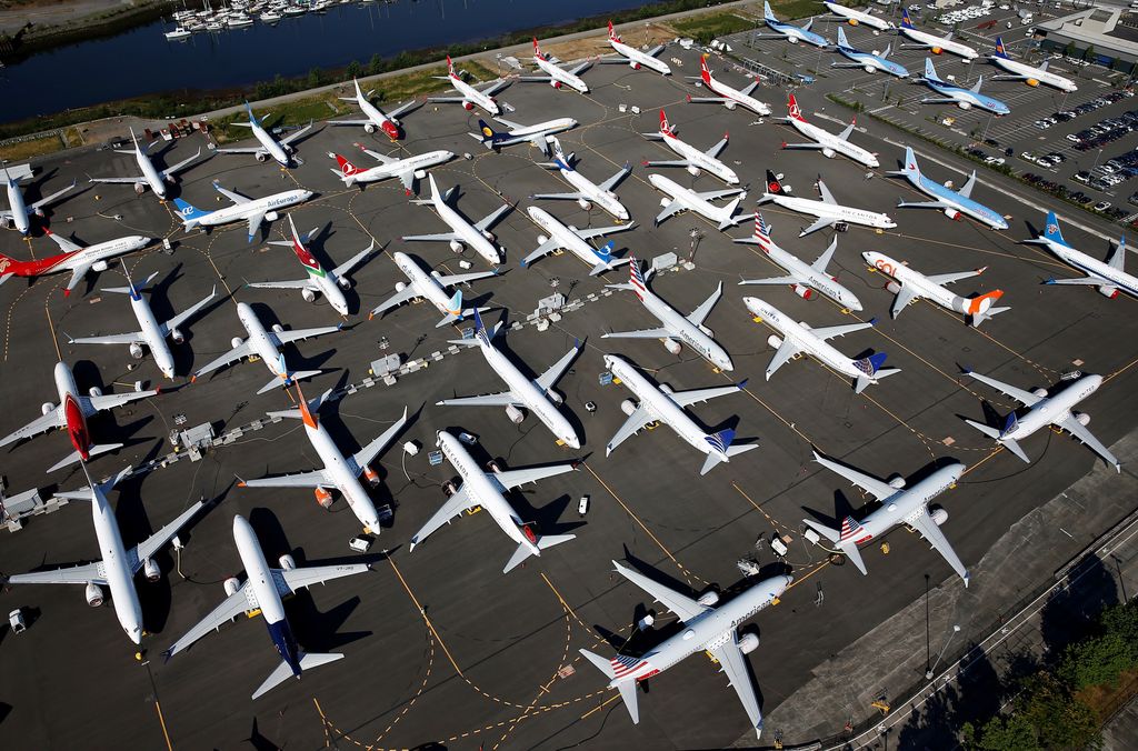Dozens of grounded Boeing 737 MAX aircraft are seen parked in an aerial photo at Boeing Field in Seattle, Washington, U.S. July 1, 2019. Picture taken July 1, 2019. REUTERS/Lindsey Wasson