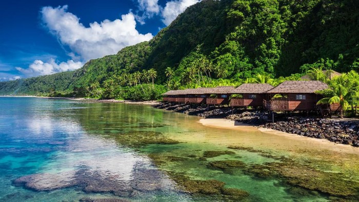Lefaga, Matautu, Samoa - August 1, 2018: Fiafia show with fire dancers at Return to Paradise resort on Upolu Island