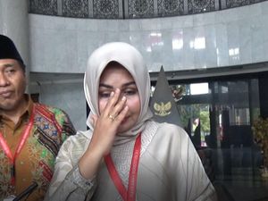Akhir Kasus Foto Terlalu Menawan: Evi Jadi Anggota Dewan