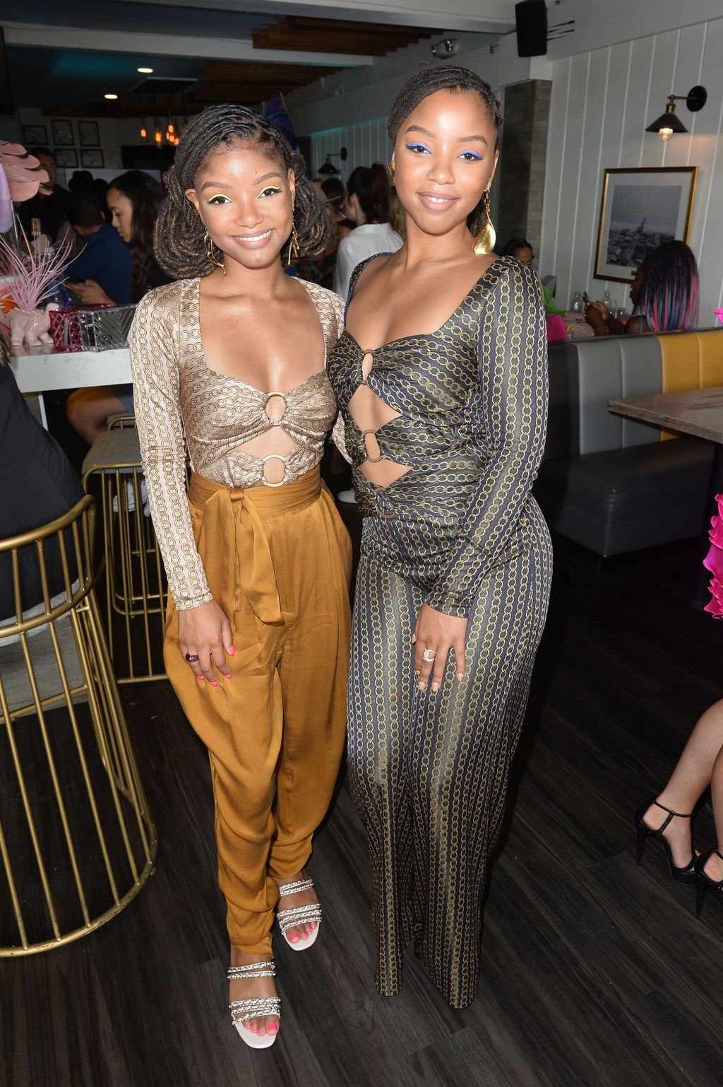 HERMOSA BEACH, CALIFORNIA - AUGUST 11: (L-R) Halle Bailey and Chloe Bailey of Chloe X Halle attend Planet Smoothie Backstage at 2019 Teen Choice Awards on August 11, 2019 in Hermosa Beach, California. (Photo by Jerod Harris/Getty Images for Mediaplacement)