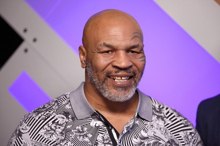 BURBANK, CALIFORNIA - JANUARY 18: (EDITORIAL USE ONLY. NO COMMERCIAL USE) Mike Tyson speaks with Mario Lopez at Capital One Podcast Studio during the 2019 iHeartRadio Podcast Awards Presented by Capital One at the iHeartRadio Theater LA on January 18, 2019 in Burbank, California.   Rich Polk/Getty Images for iHeartMedia/AFP