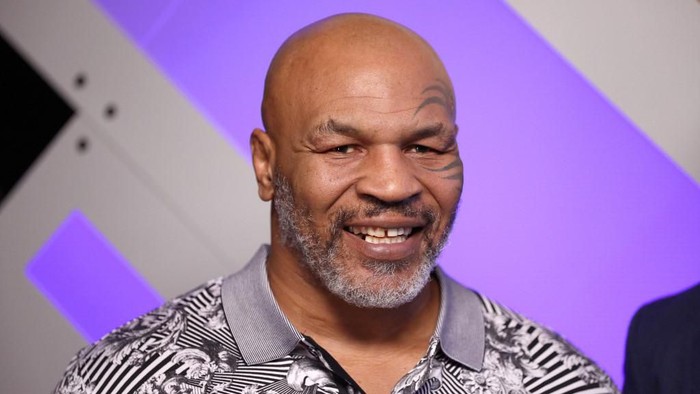 BURBANK, CALIFORNIA - JANUARY 18: (EDITORIAL USE ONLY. NO COMMERCIAL USE) Mike Tyson speaks with Mario Lopez at Capital One Podcast Studio during the 2019 iHeartRadio Podcast Awards Presented by Capital One at the iHeartRadio Theater LA on January 18, 2019 in Burbank, California.   Rich Polk/Getty Images for iHeartMedia/AFP