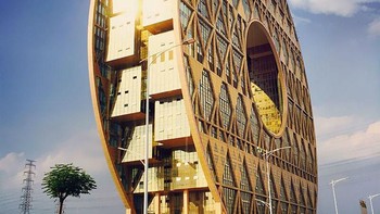 Coin building. Berbentuk seperti koin raksasa, bangunan ini jadi salah satu daya tarik utama kota Guangzhou, China. Lubang pada bangunan koin ini juga memiliki fungsi sendiri. Foto: via Brainberries