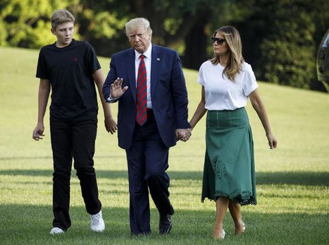 President Donald Trump, first lady Melania Trump and Barron Trump board Air Force One at Morristown Municipal Airport in Morristown, N.J., Sunday, Aug. 18, 2019, en route to Andrews Air Force Base, Md. (AP Photo/Patrick Semansky)