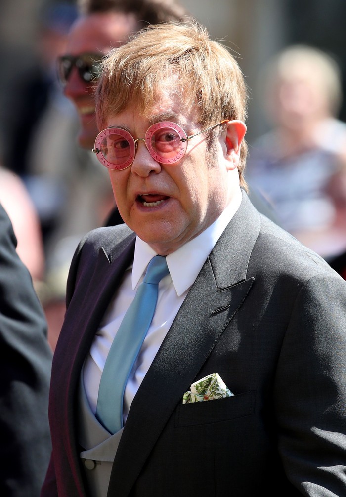 LONDON, ENGLAND - JULY 14: Prince Harry, Duke of Sussex and Meghan, Duchess of Sussex chat with British singer-songwriter Elton John at the European Premiere of Disneys The Lion King at Odeon Luxe Leicester Square on July 14, 2019 in London, England.  (Photo by Niklas Hallen-WPA Pool/Getty Images)